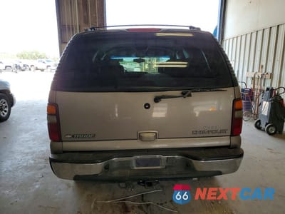 Zdjęcie 6 z 14 samochodu: 2001 CHEVROLET TAHOE C1500 VIN:1GNEC13T41J139026 - miniatura