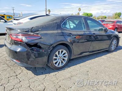 Trzecie zdjęcie samochodu z tyłu: 2021 TOYOTA CAMRY LE VIN:4T1C11AK9MU407289 - miniatura