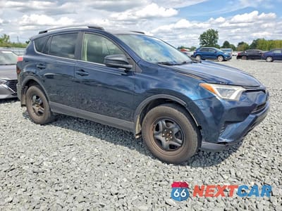 Czwarte zdjęcie samochodu z boku: 2018 TOYOTA RAV4 LE VIN:JTMBFREV2JJ747207 - miniatura