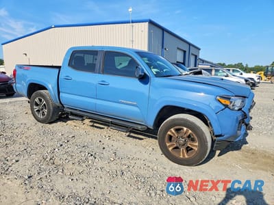 Czwarte zdjęcie samochodu z boku: 2019 TOYOTA TACOMA TRD SPORT VIN:3TMCZ5AN1KM235372 - miniatura
