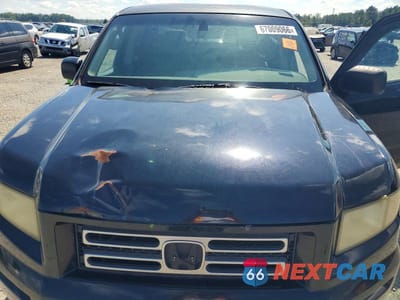 Zdjęcie 11 z 12 samochodu: 2006 HONDA RIDGELINE RT VIN:2HJYK16296H562202 - miniatura