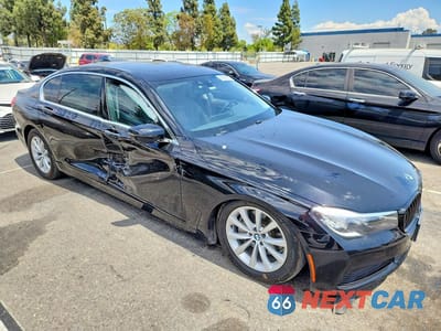 Czwarte zdjęcie samochodu z boku: 2019 BMW 740 I VIN:WBA7E2C52KB216777 - miniatura