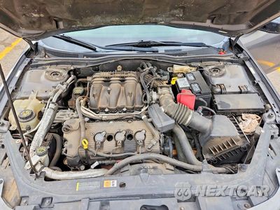 Zdjęcie 11 z 13 samochodu: 2011 FORD FUSION SE VIN:3FAHP0HGXBR199986 - miniatura