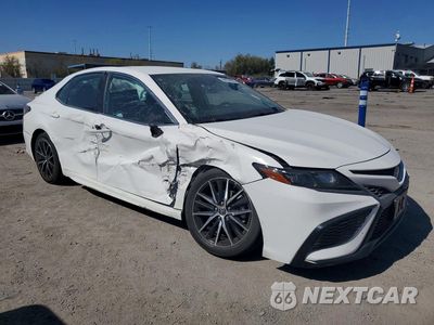 Czwarte zdjęcie samochodu z boku: 2023 TOYOTA CAMRY HYBRID SE VIN:4T1G31AK8PU609766 - miniatura