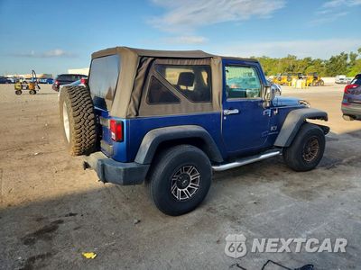 Trzecie zdjęcie samochodu z tyłu: 2009 JEEP WRANGLER X VIN:1J4FA24159L784011 - miniatura