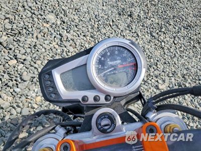 Zdjęcie 7 z 8 samochodu: 2008 TRIUMPH MOTORCYCLE STREET TRIPLE 675 VIN:SMTD01NE28J328653 - miniatura