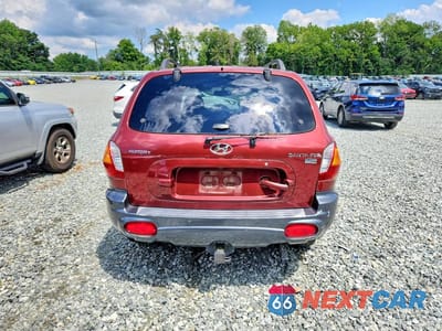 Zdjęcie 6 z 12 samochodu: 2003 HYUNDAI SANTA FE GLS VIN:KM8SC13E93U461851 - miniatura