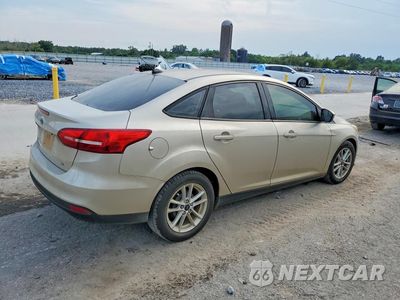 Trzecie zdjęcie samochodu z tyłu: 2018 FORD FOCUS SE VIN:1FADP3F29JL227328 - miniatura