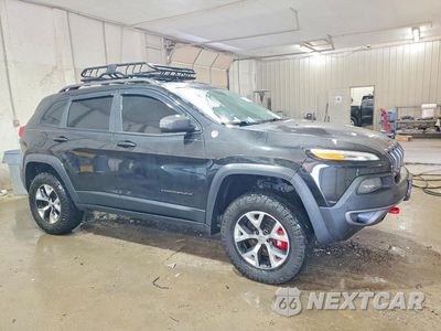 Czwarte zdjęcie samochodu z boku: 2015 JEEP CHEROKEE TRAILHAWK VIN:1C4PJMBS2FW776654 - miniatura
