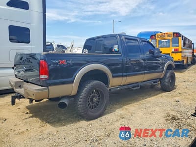 Trzecie zdjęcie samochodu z tyłu: 2011 FORD F350 SUPER DUTY VIN:1FT8W3BT3BEB69526 - miniatura