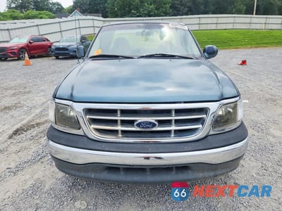 Piąte zdjęcie samochodu w środku: 1999 FORD F150 VIN:1FTZF1729XNA68877 - miniatura