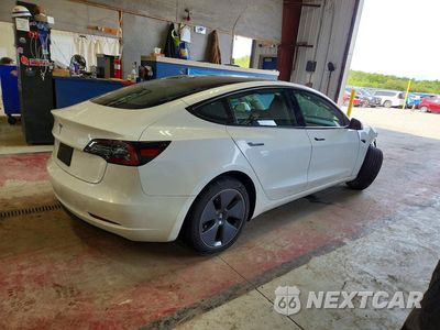 Trzecie zdjęcie samochodu z tyłu: 2023 TESLA MODEL 3 VIN:5YJ3E1EA9PF498698 - miniatura