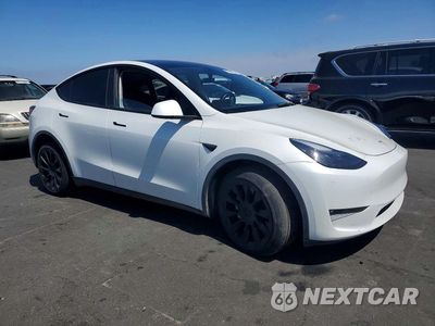 Czwarte zdjęcie samochodu z boku: 2023 TESLA MODEL Y VIN:7SAYGDEE4PF782036 - miniatura