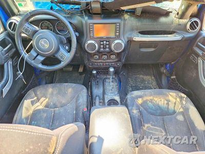 Zdjęcie 8 z 13 samochodu: 2015 JEEP WRANGLER UNLIMITED SAHARA VIN:1C4BJWEG3FL588952 - miniatura
