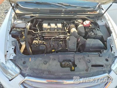 Zdjęcie 11 z 12 samochodu: 2014 FORD TAURUS SEL VIN:1FAHP2H89EG124518 - miniatura