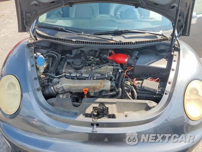 Zdjęcie 11 z 12 samochodu: 2004 VOLKSWAGEN NEW BEETLE GLS VIN:3VWCD31Y04M339316 - miniatura