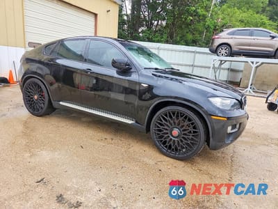 Czwarte zdjęcie samochodu z boku: 2013 BMW X6 XDRIVE35I VIN:5UXFG2C5XDL783386 - miniatura