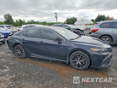 Czwarte zdjęcie samochodu z boku: 2024 TOYOTA CAMRY HYBRID SE VIN:4T1G31AK9RU072473 - miniatura