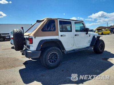 Trzecie zdjęcie samochodu z tyłu: 2014 JEEP WRANGLER UNLIMITED SPORT VIN:1C4BJWDG6EL145906 - miniatura