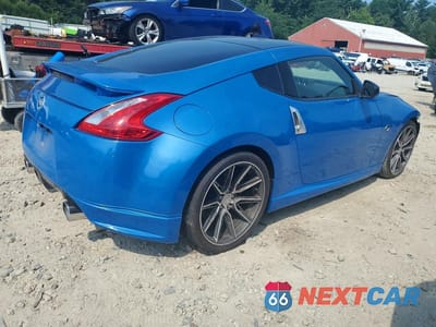 Trzecie zdjęcie samochodu z tyłu: 2009 NISSAN 370Z BASE VIN:JN1AZ44EX9M405699 - miniatura