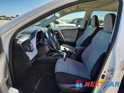 Zdjęcie 7 z 14 samochodu: 2018 TOYOTA RAV4 HYBRID XLE VIN:JTMRJREVXJD158188 - miniatura