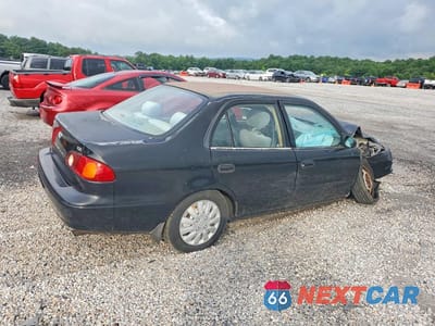 Trzecie zdjęcie samochodu z tyłu: 2002 TOYOTA COROLLA CE VIN:2T1BR12EX2C527517 - miniatura