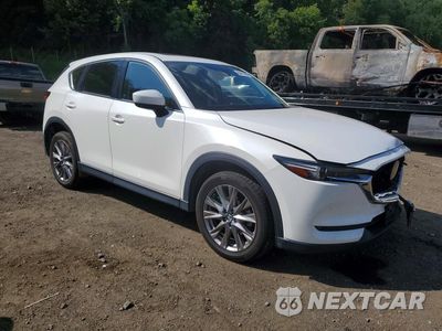 Czwarte zdjęcie samochodu z boku: 2021 MAZDA CX-5 GRAND TOURING RESERVE VIN:JM3KFBAY1M0466279 - miniatura