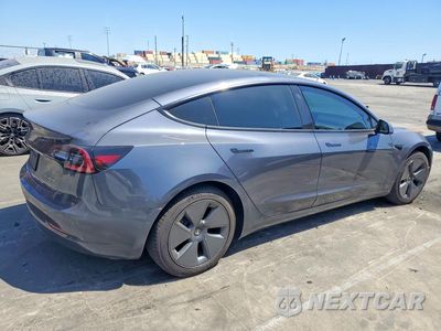 Trzecie zdjęcie samochodu z tyłu: 2022 TESLA MODEL 3 VIN:5YJ3E1EB8NF267118 - miniatura