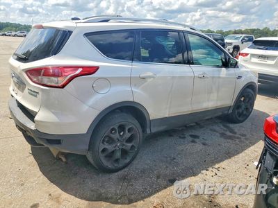Trzecie zdjęcie samochodu z tyłu: 2016 FORD ESCAPE TITANIUM VIN:1FMCU0J99GUC64699 - miniatura