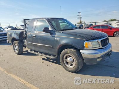Czwarte zdjęcie samochodu z boku: 1999 FORD F150 VIN:1FTRX18L0XNB90225 - miniatura