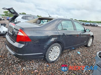 Trzecie zdjęcie samochodu z tyłu: 2011 FORD FUSION HYBRID VIN:3FADP0L35BR125989 - miniatura