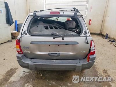 Zdjęcie 6 z 13 samochodu: 1999 JEEP GRAND CHEROKEE LAREDO VIN:1J4GW58N6XC711263 - miniatura