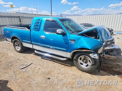 Czwarte zdjęcie samochodu z boku: 1998 FORD F150 VIN:2FTZX1763WCA11403 - miniatura