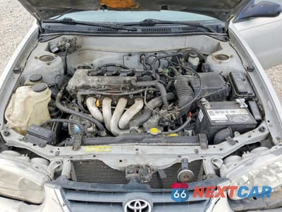 Zdjęcie 11 z 12 samochodu: 2001 TOYOTA COROLLA CE VIN:1NXBR12E71Z538617 - miniatura