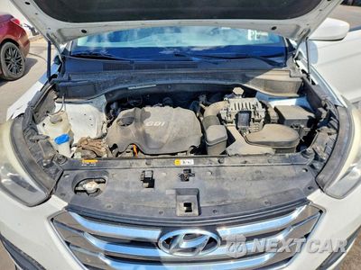 Zdjęcie 12 z 13 samochodu: 2014 HYUNDAI SANTA FE SPORT 2.4L VIN:5XYZT3LB9EG144029 - miniatura