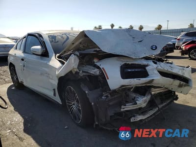 Czwarte zdjęcie samochodu z boku: 2019 BMW 530E VIN:WBAJA9C56KB392905 - miniatura