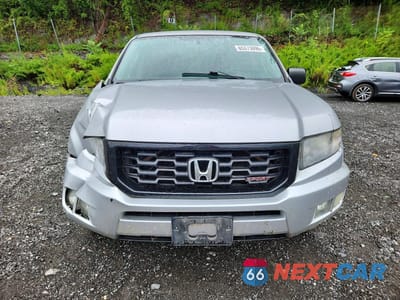 Piąte zdjęcie samochodu w środku: 2014 HONDA RIDGELINE SPORT VIN:5FPYK1F75EB004097 - miniatura