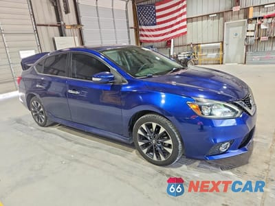 Czwarte zdjęcie samochodu z boku: 2018 NISSAN SENTRA SR VIN:3N1AB7AP5JY203768 - miniatura