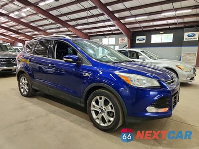 Czwarte zdjęcie samochodu z boku: 2014 FORD ESCAPE TITANIUM VIN:1FMCU9JX6EUD15270 - miniatura