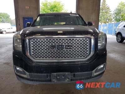Piąte zdjęcie samochodu w środku: 2017 GMC YUKON XL DENALI VIN:1GKS2HKJXHR261946 - miniatura