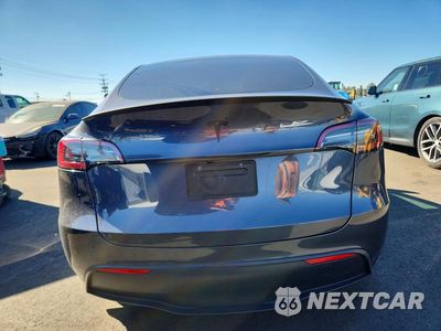 Zdjęcie 6 z 12 samochodu: 2023 TESLA MODEL Y VIN:7SAYGDEF2PF881303 - miniatura