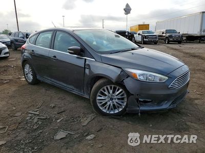 Czwarte zdjęcie samochodu z boku: 2017 FORD FOCUS TITANIUM VIN:1FADP3N24HL220170 - miniatura