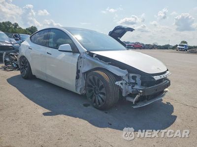 Czwarte zdjęcie samochodu z boku: 2020 TESLA MODEL Y VIN:5YJYGDEF5LF003551 - miniatura
