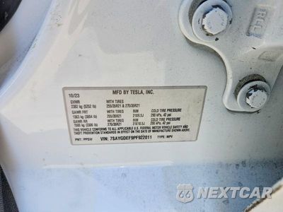 Zdjęcie 13 z 13 samochodu: 2023 TESLA MODEL Y VIN:7SAYGDEF9PF922011 - miniatura