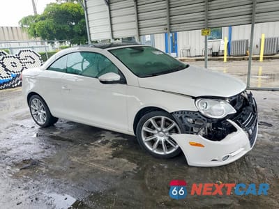 Czwarte zdjęcie samochodu z boku: 2010 VOLKSWAGEN EOS LUX VIN:WVWFA7AH7AV011795 - miniatura