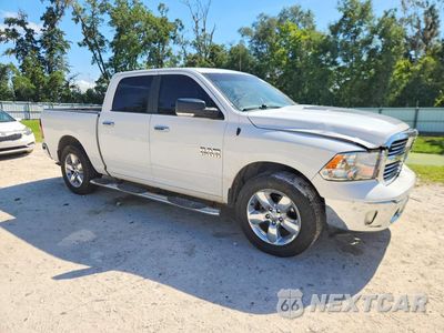 Czwarte zdjęcie samochodu z boku: 2018 RAM 1500 SLT VIN:1C6RR6LG1JS234699 - miniatura