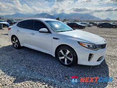 Czwarte zdjęcie samochodu z boku: 2017 KIA OPTIMA SX VIN:5XXGW4L23HG131659 - miniatura