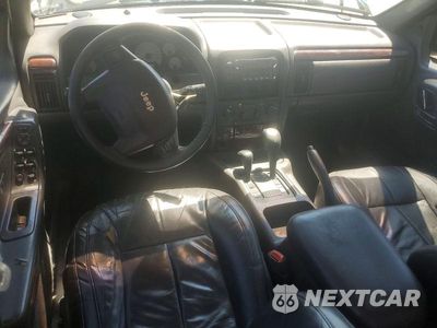 Zdjęcie 8 z 13 samochodu: 2001 JEEP GRAND CHEROKEE LIMITED VIN:1J4GW58N21C687387 - miniatura