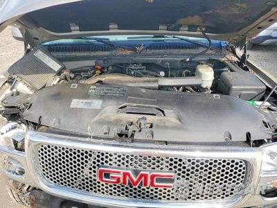 Zdjęcie 12 z 13 samochodu: 2004 GMC YUKON XL DENALI VIN:1GKFK66U04J236220 - miniatura