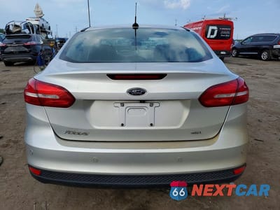 Zdjęcie 6 z 12 samochodu: 2018 FORD FOCUS SEL VIN:1FADP3H23JL242484 - miniatura